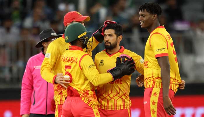 Zimbabwe’s players celebrate after the dismissal of Pakistan’s Haider Ali (not pictured) during the ICC men’s Twenty20 World Cup 2022. — AFP