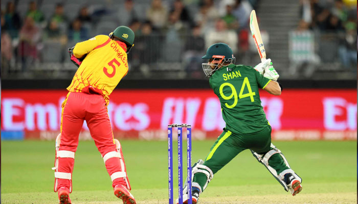 Pakistans Shan Masood (R) plays a shot as Zimbabwes wicketkeeper Regis Chakabva watches during the ICC T20 World Cup 2022 cricket match between Pakistan and Zimbabwe in Perth on October 27, 2022. — AFP/File