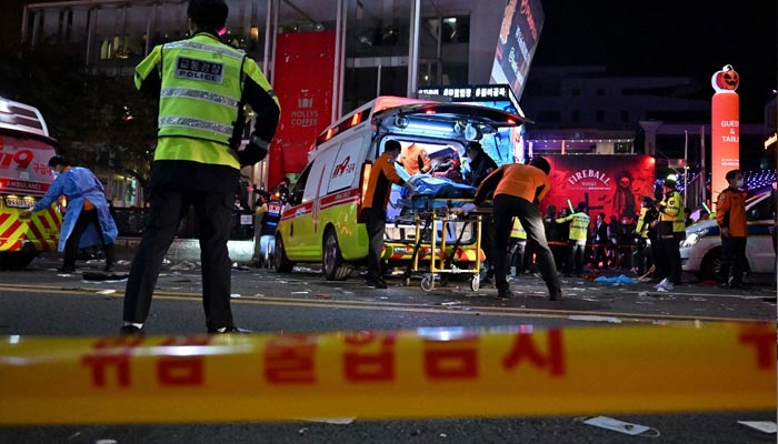 More than 150 people were killed and scores more were injured in a deadly stampede at a packed Halloween event in central Seoul on October 29, 2022. — AFP