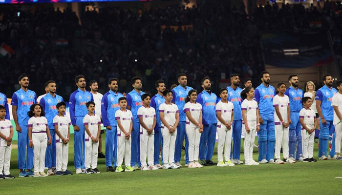 Indian players stand during the national anthem before the start of the ICC mens T20 World Cup 2022 cricket match between India and South Africa at the Perth Stadium in Perth on October 30, 2022. — AFP
