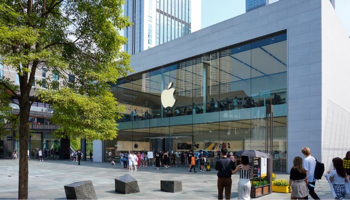 People walking past Apple Store At Sino-Ocean Taikoo Li Chengdu.— Unsplash