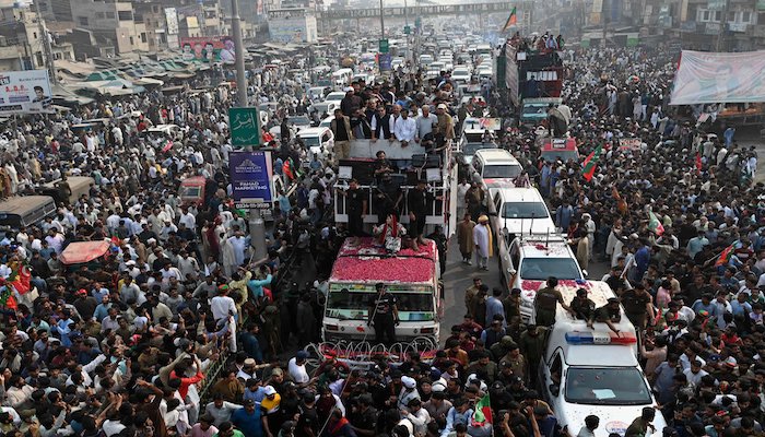 A view of PTI chair Imran Khan’s caravan as the party continues its anti-government protest march towards Islamabad. - AFP
