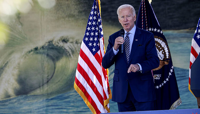 US President Joe Biden speaks with dignitaries and employees at ViaSat on November 4, 2022 in Carlsbad, California.