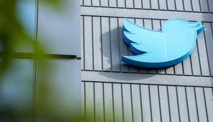 The Twitter logo is seen on a sign on the outside of the Twitter headquarters in San Francisco, California, US, October 28, 2022. - AFP