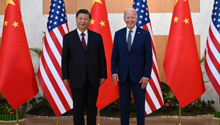US President Joe Biden (R) and Chinas President Xi Jinping (L) meet on the sidelines of the G20 Summit in Nusa Dua on the Indonesian resort island of Bali on November 14, 2022. — AFP/File