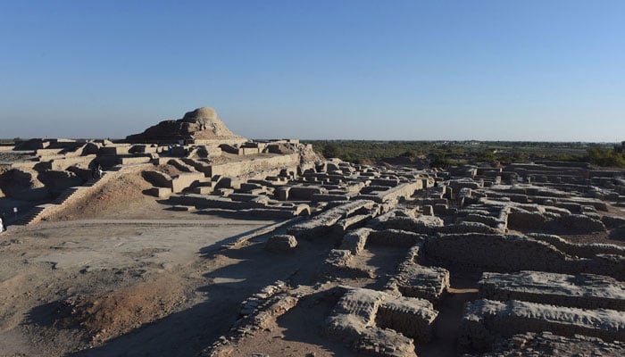 In this file photo taken on February 9, 2017 visitors walk through the UNESCO World Heritage archaeological site of Mohenjo Daro some 425 kms north of the Pakistani city of Karachi. — AFP/File