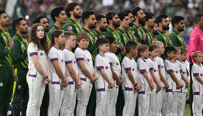 Pakistans Captain Babar Azam (2R) leads his players in the national anthem ahead of the ICC men´s Twenty20 World Cup 2022 final cricket match between England and Pakistan at The Melbourne Cricket Ground (MCG) in Melbourne on November 13, 2022. — AFP/File