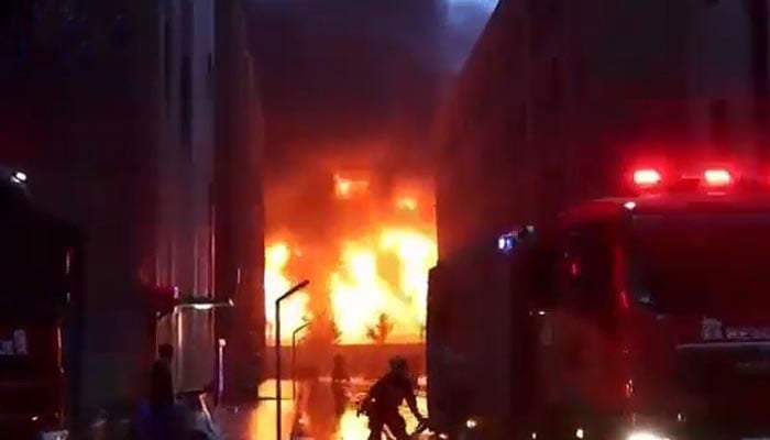 Screengrab from video showing fire rescue teams trying to extinguish massive inferno at a plant in Anyang City, Henan province. — Twitter