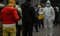 Beijing sees record COVID cases as China outbreak spirals