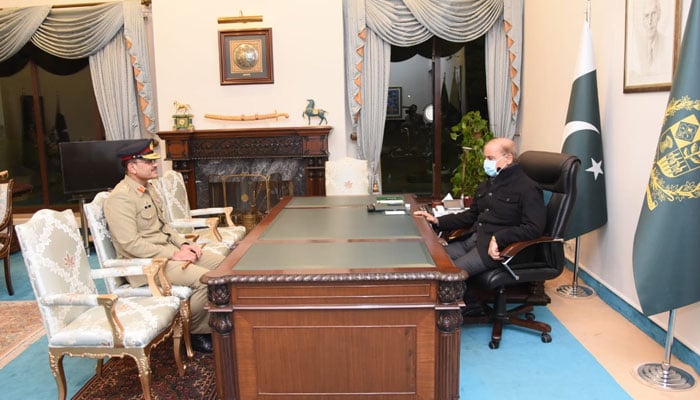 Prime Minister Shehbaz Sharif meets the newly appointed Chief of Army Staff Lieutenant General Asim Munir. — Twitter/@pmln_org
