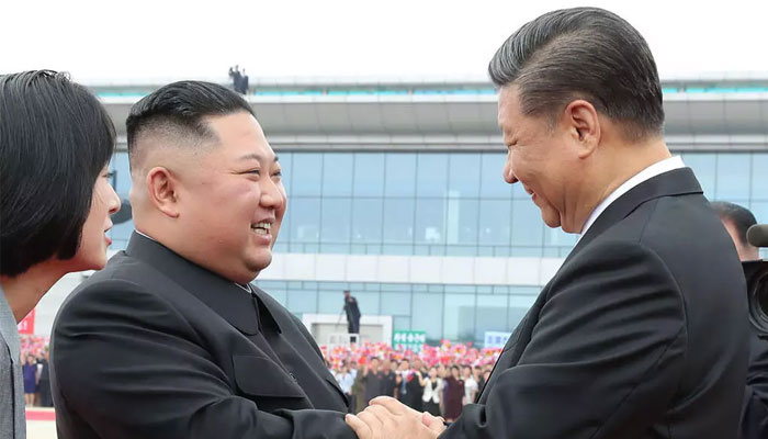 Xi Jinping and Kim Jong Un in Pyongyang in 2019. — AFP/File