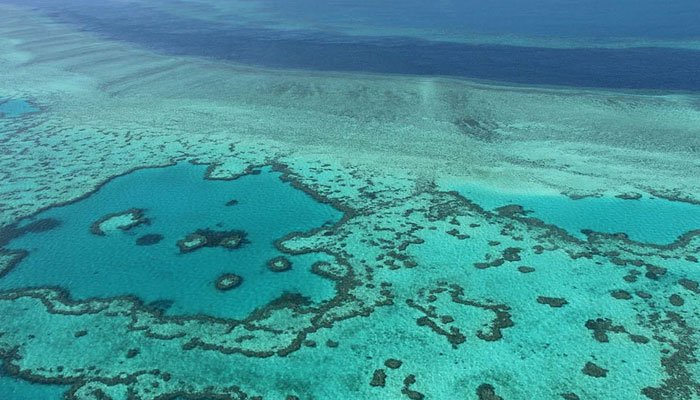 An aerial view of the Great Barrier Reef off the coast of the Whitsunday Islands, along the central coast of Queensland. — AFP/File