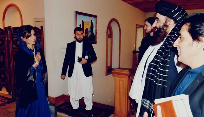 Minister of the State on Foreign Affairs Hina Rabbani (left) Khar is greeting Afghan FM Amir Khan Muttaqi (centre-right). — FO