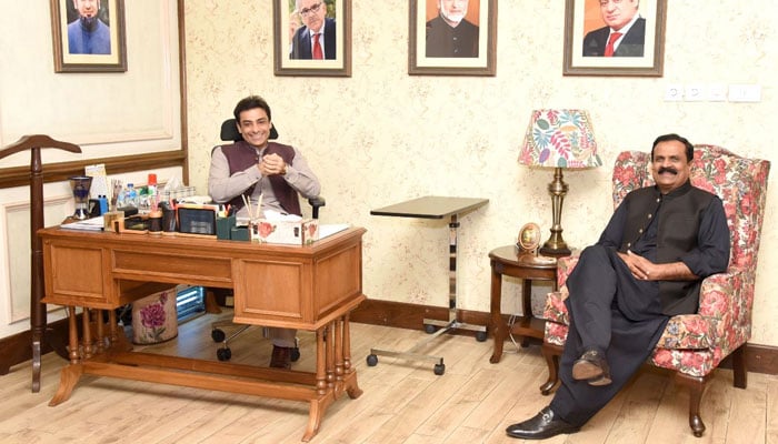PML-N leader Hamza Shahbaz (left) meets PPP Punjab leader Hassan Murtaza in Lahore, on November 29, 2022. — PML-N
