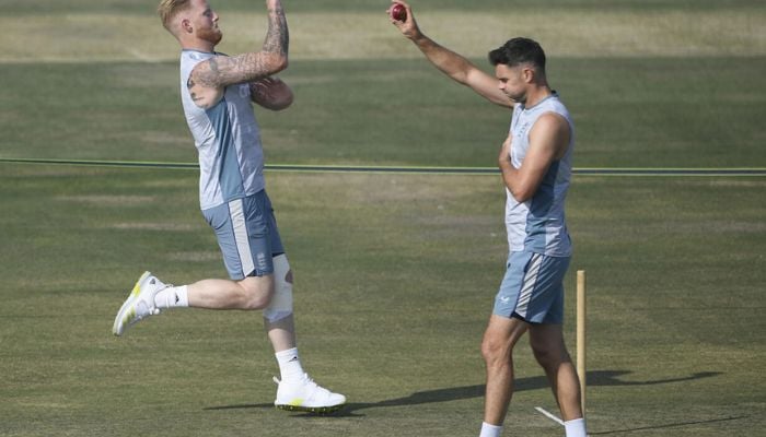 Englands captain Ben Stokes, left, and James Anderson train at the Rawalpindi Cricket Stadium in Pakistan.— AFP