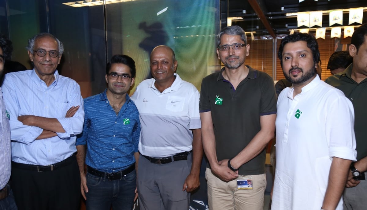 President of Geo and Jang Group Imran Aslam (left) poses along with Geo News anchorpersons Shahzeb Khanzada (second left), and Geo News Managing Director Azhar Abbas.