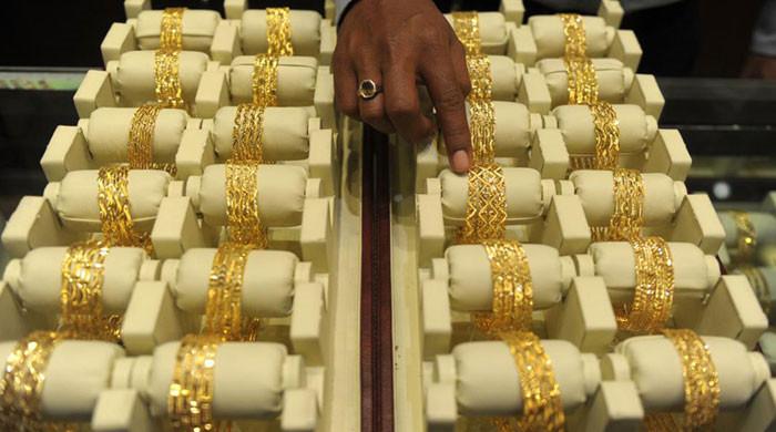 Gold scales new peak, price rises by Rs750 per tola in Pakistan
