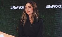 Victoria Beckham looks ethereal in chic black coat at fashion event