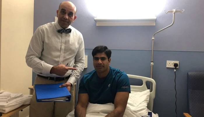 Nadeem (R) with Bajwa (L) after the surgery — provided by the author