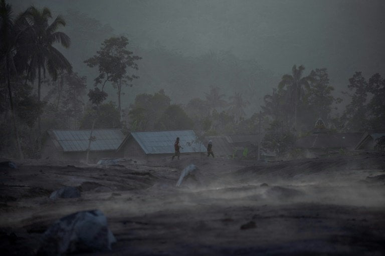 Kajar Kuning village in Lumajang has been covered in a mix of ash and mud. - AFP