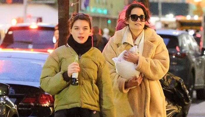 Katie Homes enjoys an evening out with daughter Suri Cruise