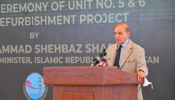 Prime Minister Shehbaz Sharif addresses the inaugural ceremony of the refurbishment of unit 5 and 6 of Mangla Dam in Mangla on December 5, 2022. — PID
