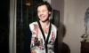 Harry Styles cheers for England’s World Cup victory against Senegal