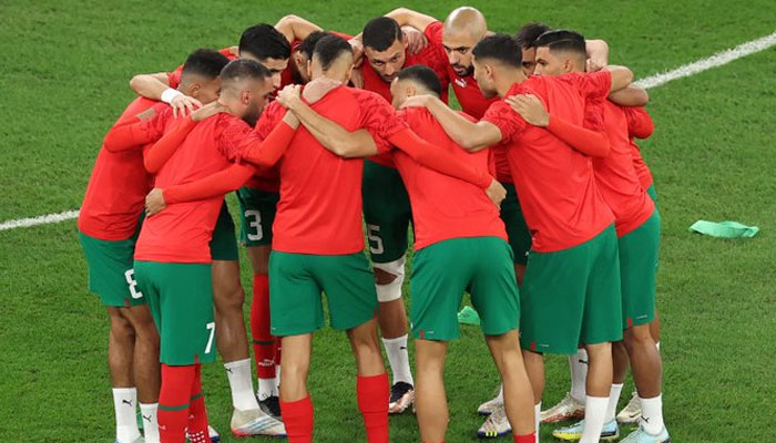 Moroccon players huddle during the World Cup quarter-finals against Spain in Qatar on December 6, 2022. — AFP/File