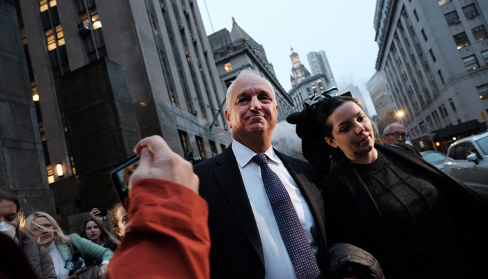 Alan Futerfas, an attorney for the Trump Payroll Corporation, walks out of the New York Supreme Court after the Trump Organization was convicted on all charges in a criminal tax fraud scheme on December 06, 2022 in New York City. —AFP