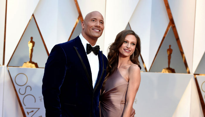 Dwayne Johnson watched emotionally as his wife Lauren Hashian sang the national anthem while holding their daughter - Daily USA News