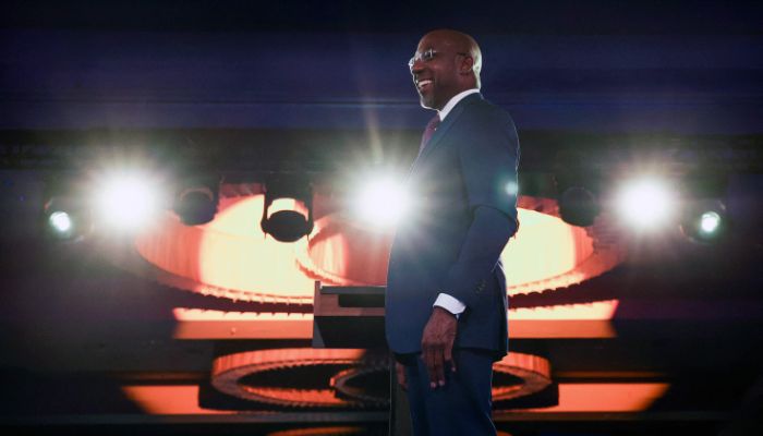 Georgia Democratic Senate candidate U.S. Sen. Raphael Warnock (D-GA) speaks during an election night watch party at the Marriott Marquis on December 6, 2022 in Atlanta, Georgia. Sen.— AFP