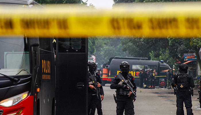 Police secure the site of a suicide bombing outside a police station at Astanaanyar in Bandung, West Java province, on December 7, 2022. — AFP