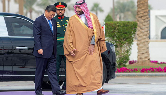 This handout picture provided by the Saudi Royal Palace shows Saudi Crown Prince Mohammed bin Salman (R) welcoming Chinese President Xi Jinping during a ceremony in the capital Riyadh, on December 8, 2022. — AFP