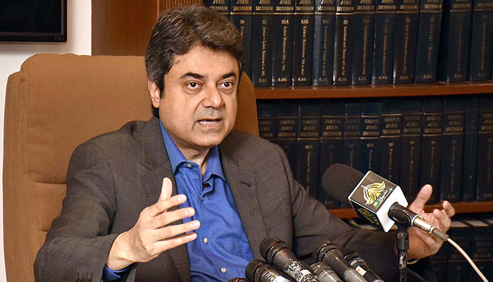 Federal Minister for Law and Justice Barrister Dr Muhammad Farogh Naseem addresses a press conference in Karachi on February 20, 2022. — APP