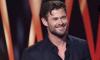 Russell Crowe presents AACTA award to Chris Hemsworth 