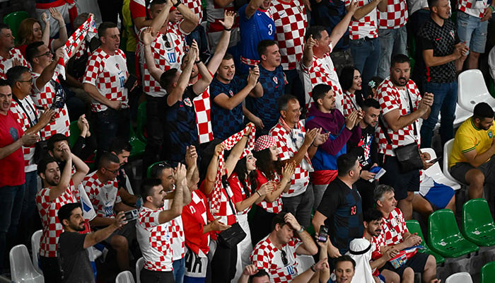 Croatias supporters cheer before the start of the Qatar 2022 World Cup quarter-final football match between Croatia and Brazil at Education City Stadium in Al-Rayyan, west of Doha, on December 9, 2022.  AFP