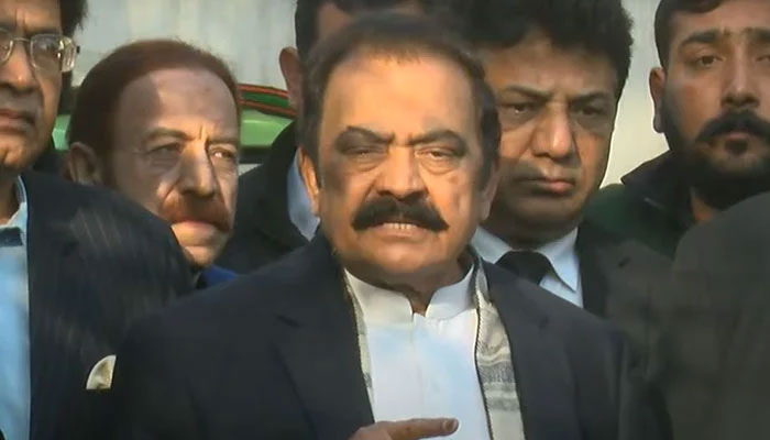 Interior Minister Rana Sanaullah speaking to media representatives outside special court in Lahore. — YouTube/ HumNews screengrab