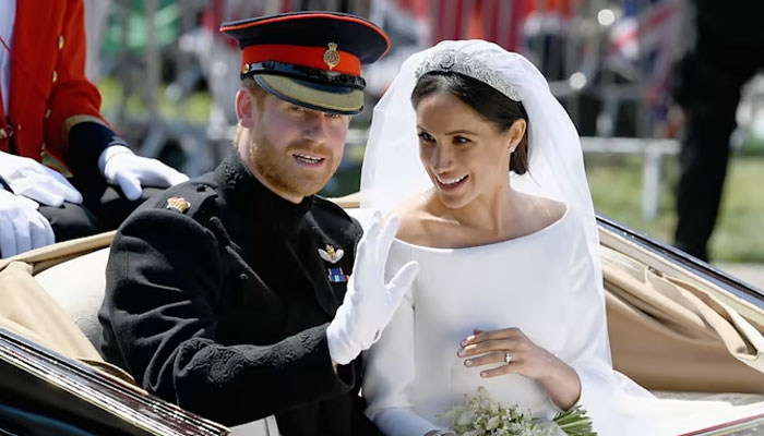 Meghan Markle vivaciously talks about wedding with reserved Harry