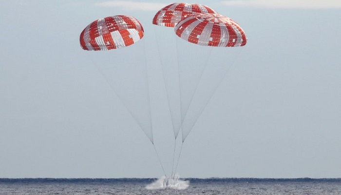 NASAs unmanned Orion spaceship splashes down in the Pacific Ocean off Baja California, Mexico, on December 11, 2022. — AFP