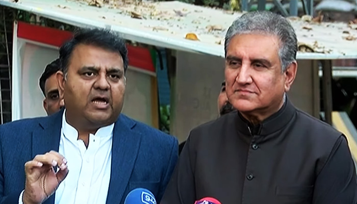Pakistan Tehreek-e-Insaf (PTI) Senior Vice President Fawad Chaudhry (left) addresses a press conference alongside PTI Vice Chairman Shah Mahmood Qureshi in Lahore on December 15, 2022. — YouTube/GeoNews
