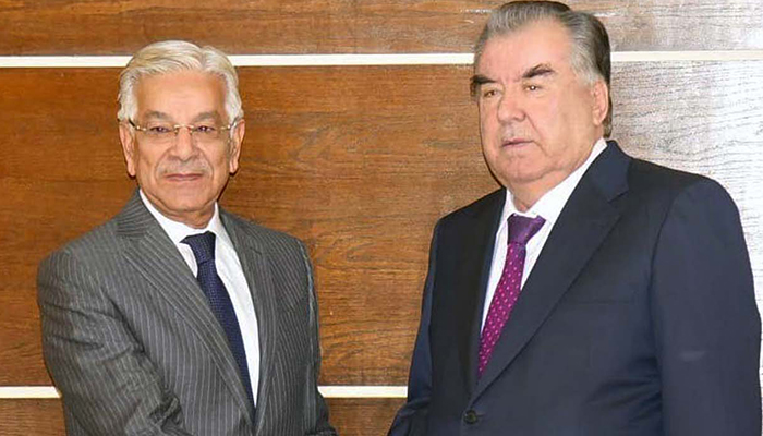 Minister for Defence Khawaja Muhammad Asif shakes hands with Emomali Rahmon, President of the Republic of Tajikistan in Islamabad on December 15, 2022. — APP