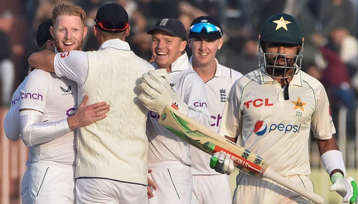England celebrate a wicket during Pakistan Test — AFP