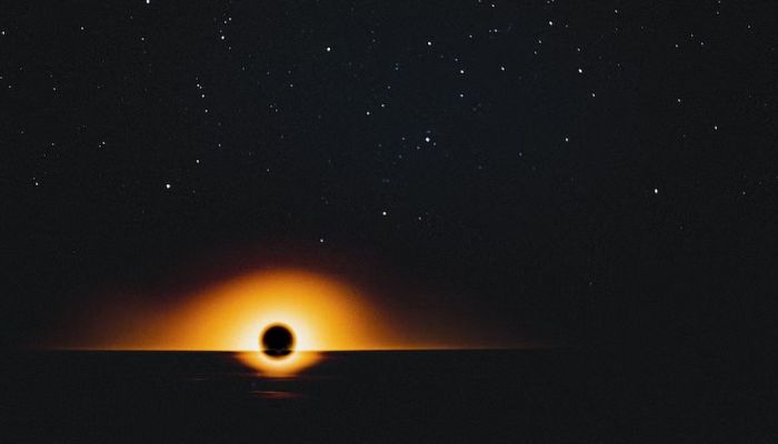 The event horizon is a mysterious, unseen layer that surrounds black holes and is the boundary beyond which nothing, including matter, light, or information, may pass.— Unsplash