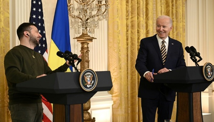 US President Joe Biden and Ukraines President Volodymyr Zelensky hold a news conference at the White House on December 21, 2022. — AFP