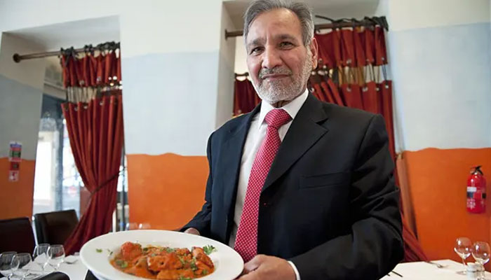 Aslam with his signature dish in 2009. — AFP/File