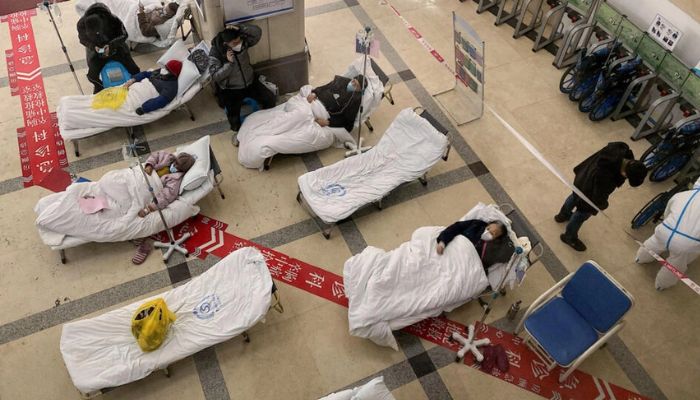 Hospitals in the central Chinese city of Chongqing are overflowing with Covid cases as the country battles a coronavirus wave.— AFP