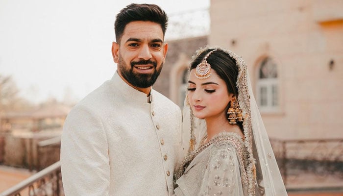 Pakistan pacer Haris Rauf poses for a picture with his wife Muzna Masood Malik after his Nikah ceremony on December 24, 2022. — Instagram/@pictroizzah
