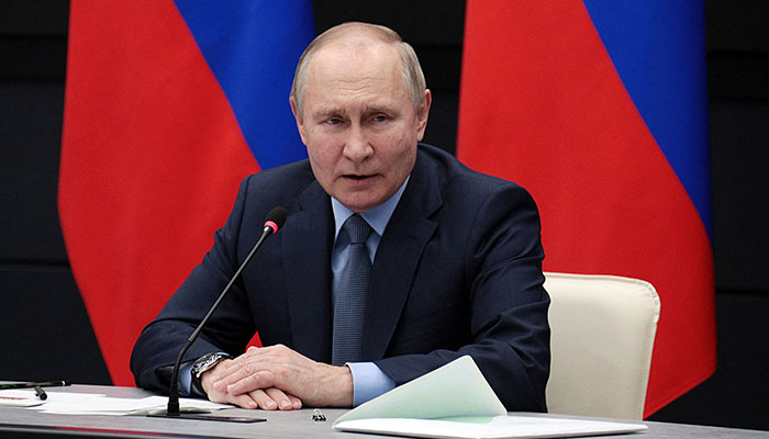 Rusya Devlet Başkanı Vladimir Putin, 23 Aralık 2022'de Rusya'nın Tula kentinde askeri-endüstriyel kompleks işletmelerinin liderleriyle bir toplantıya başkanlık ediyor. — AFP