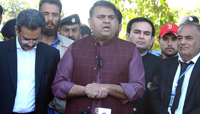 Pakistan Tehreek-e-Insaf (PTI) Senior Vice-President Fawad Chaudhry speaks with media outside Election Commission Office on December 22, 2022. — INP
