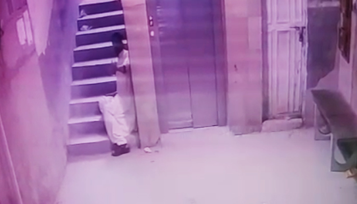 Amir Hussain can be seen in this CCTV footage screengrab after policemen shot him dead in Karachi on December 27, 2022. — Screengrab/Reporter